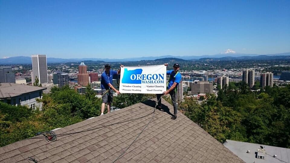 On the roof, Portland skyline and Mt. Hood behind us.