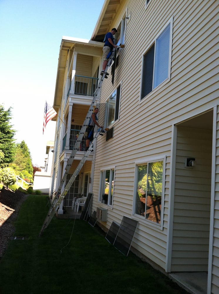 Three-story residential — two-crew, four-story ladders, coordinated top-down.